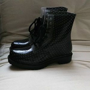 Women's ankle-length rain boots.